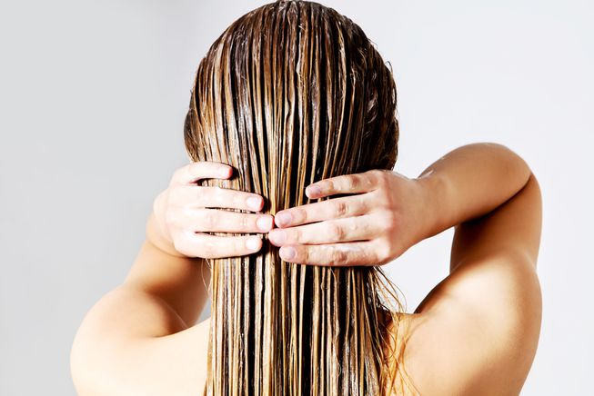 woman washing conditioning hair.jpg.653x0 q80 crop smart