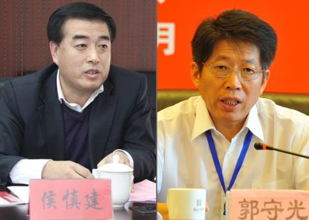 Bí thư Đảng ủy Tổng cục Địa chất Trung Quốc Hầu Thận Kiến (trái) và Bí thư Ban Kỷ luật Quách Thủ Quang (phải)