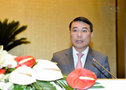 (Thống đốc ngân hàng, ông Lê Minh Hưng phát biểu trong phiên họp Quốc hội khoá XIV. Ảnh: quochoi.vn)