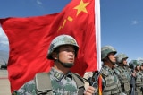 chinese soldiers flag china military drill getty 640x480